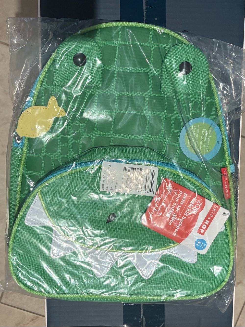 Skip Hop Green Dino Toddler Backpack with Yellow Fish Accent
